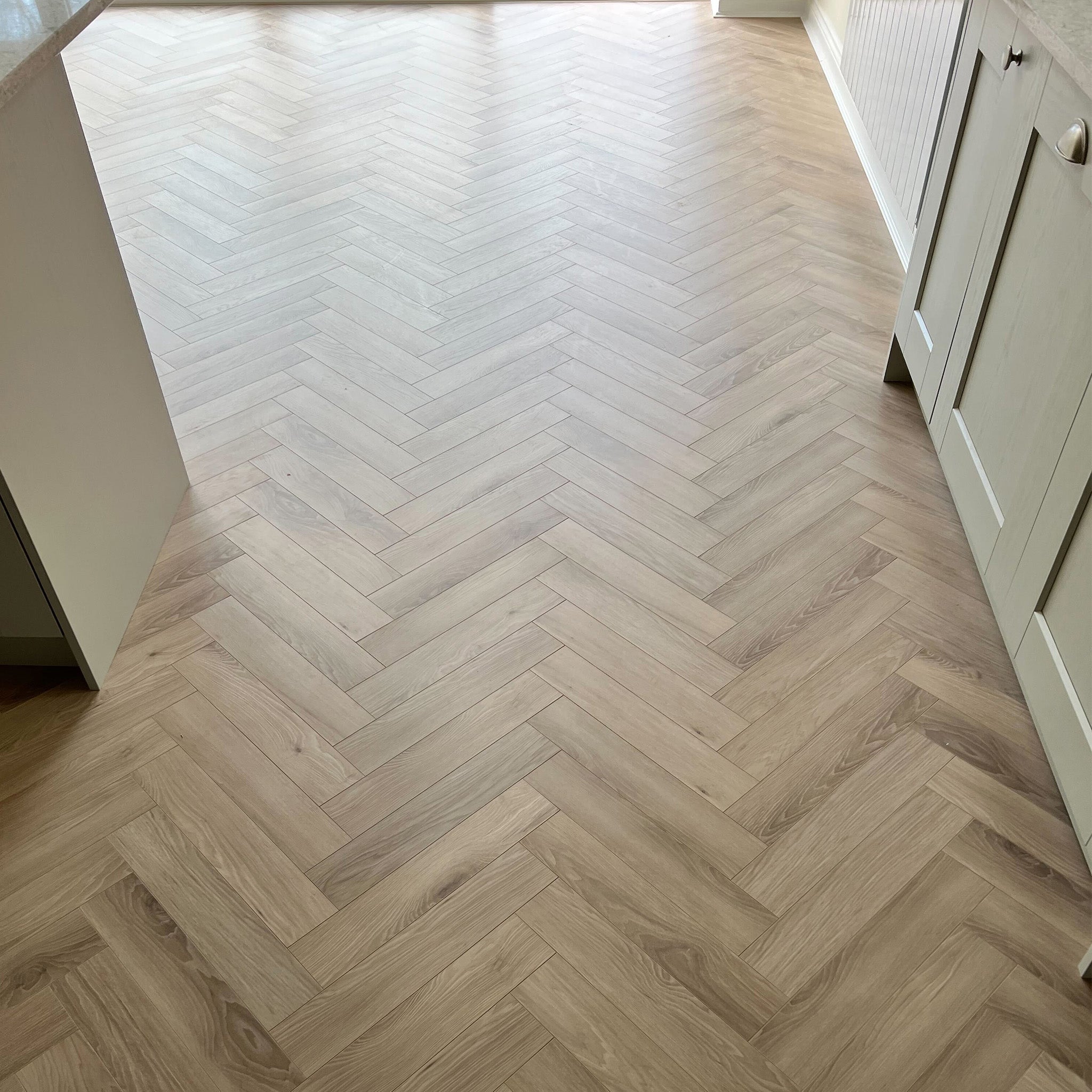 Malmo-12mm-Herringbone-Laminate-lifestyle-10