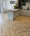 Greige-Oak-12mm-Herringbone-Laminate-lifestyle-2-1